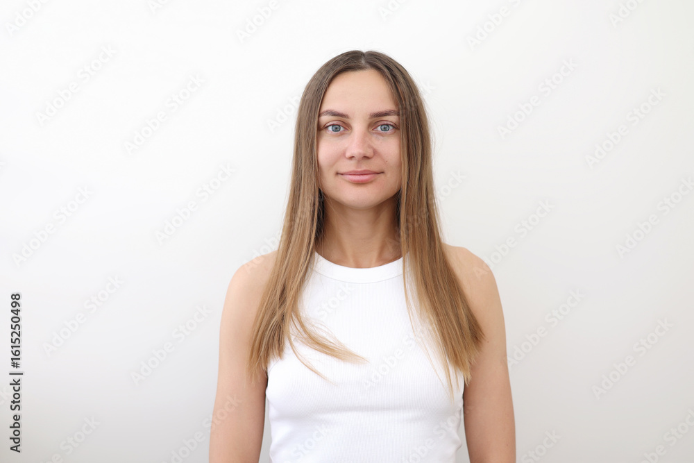Portrait of young naturally beauty brunette woman with perfect smooth skin, smiling and looking in camera isolated over white background. Facial and skin care, plastic surgery, cosmetology, cosmetics Portrait of young naturally beauty brunette woman with perfect smooth skin, smiling and looking in camera isolated over white background. Facial and skin care, plastic surgery, cosmetology, cosmetics