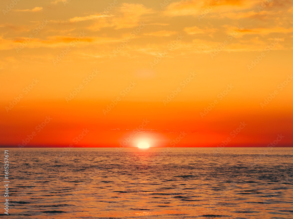 Fototapeta premium Sunlight Giving Orange Color To The Sunset Sky 