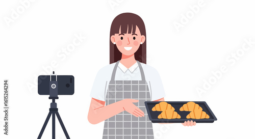Smiling woman baker presents freshly baked croissants during online cooking demonstration.