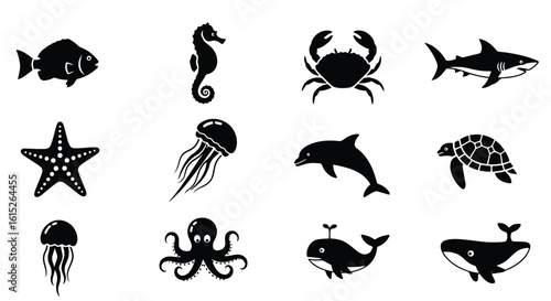 Vector silhouette illustration a collection of marine animal silhouettes including a jellyfish, dolphin, and crab, isolated on a white background