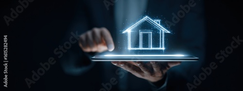 Innovative technology showcases digital house concept on tablet at night