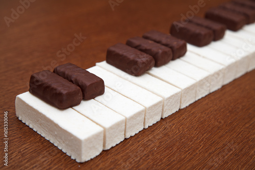 piano keyboard made of chocolates and marshmallows