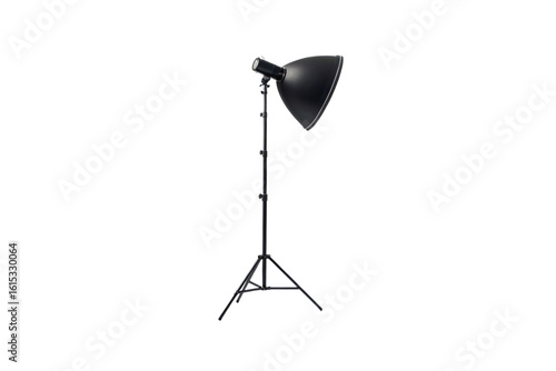 Black photography studio light with large reflector dish mounted on adjustable tripod stand, isolated on a transparent background