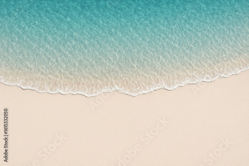 Calm ocean wave gently washing over a pristine sandy shore, creating a peaceful and idyllic summer paradise background