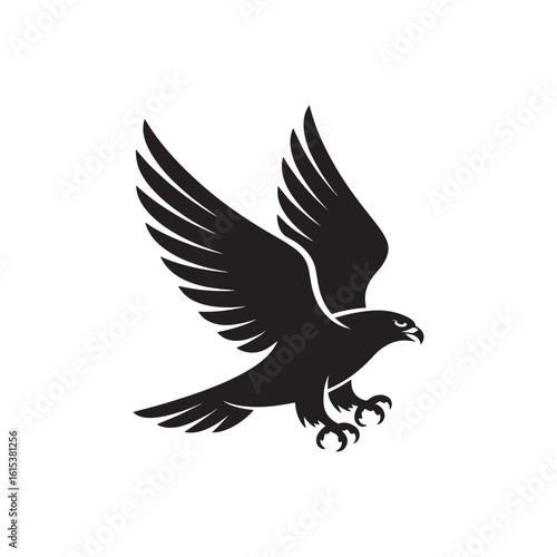 Black silhouette of a hawk in flight with wings spread and talons extended falcon eagle