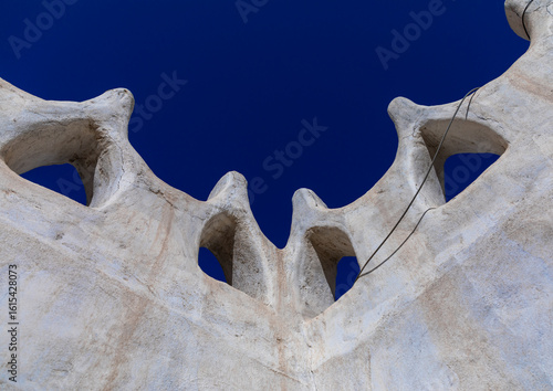 Traditional mud house crenels against blue sky, Najran Province, Najran, Saudi Arabia