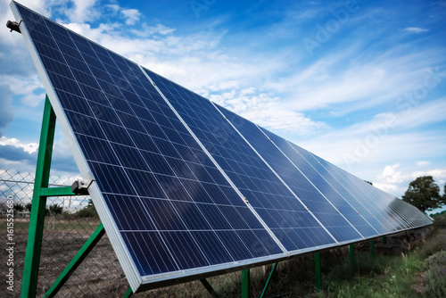 Installed solar panel generating green energy electric. Green energy reduce carbon emissions and makes earth cleaner and more ecological. Modern technologies.	