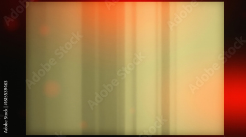 A vintage film reel with warm tones and light leaks.