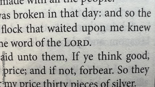 Inspirational video showing the word “Lord” at the center of the screen, while background images of Bible pages slowly change. A spiritual and calming motion clip ideal for worship
