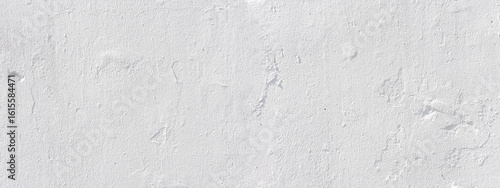 White concrete wall texture showing signs of age and wear
