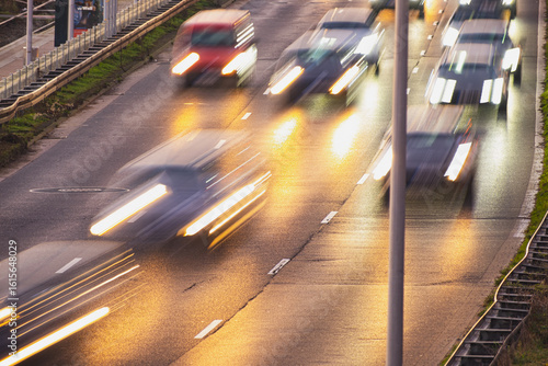 Photos Blurry cars in motion on a busy road during the evening rush hour