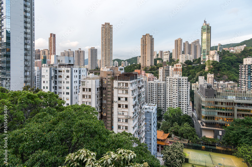 Fototapeta premium View to the skyscarpers of Hong Kong from Blue Pool Road. Cityscape and an endless array of skyscrapers.