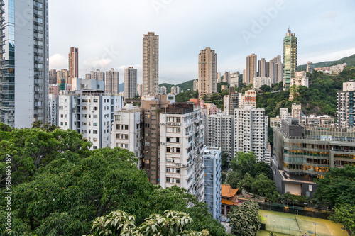 Fotografie View to the skyscarpers of Hong Kong from Blue Pool Road
