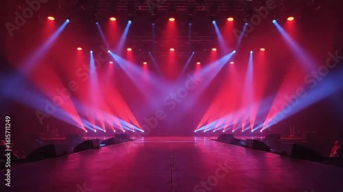 Dynamic Stage Lighting Display with Red and Blue Hues in Concert Venue