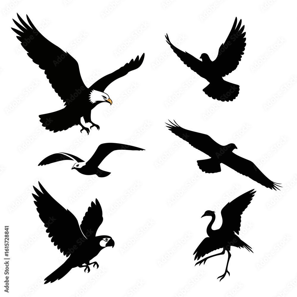 Obraz premium Soaring Silhouettes: A collection of captivating bird silhouettes takes flight, capturing the essence of freedom and the grace of nature.