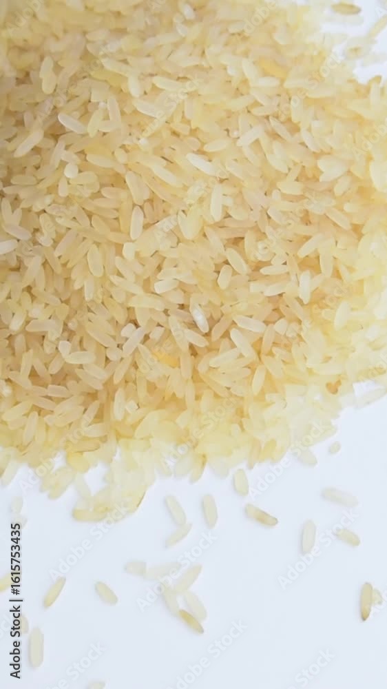 Rice pouring onto the surface - close-up Rice pouring onto the surface - close-up