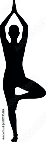 Silhouette of woman in tree pose yoga