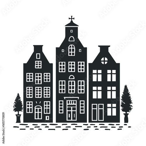 Silhouette of historic european townhouses with trees and paved street