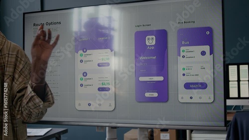 Cropped shot of African American woman presenting interface of bus booking mobile app suggesting clean UI design for welcome and route search pages while pointing at screen in office space