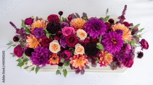 Wallpaper Mural A vibrant bouquet of wildflowers including dahlias, roses, and small blooms in rich purple and warm tones, Torontodigital.ca