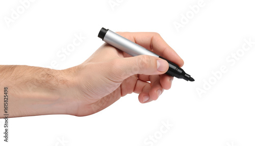 Closeup of hand holding pen against a dark background, study in contrast and minimalism