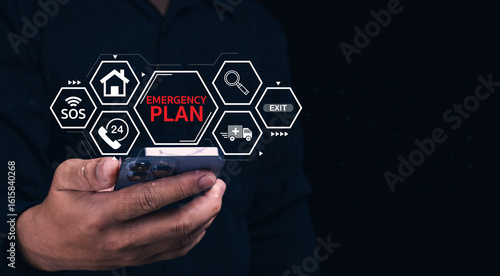 A person holding a smartphone with digital emergency plan icons, including SOS, 24-hour service, exit, ambulance, and home symbols on a dark background.