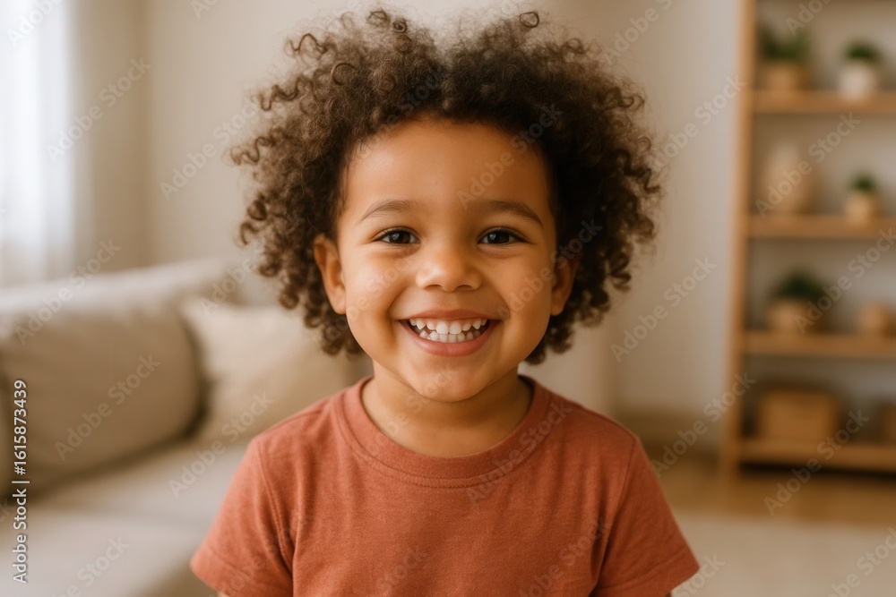 A young child's radiant smile captures the essence of innocent happiness A young child's radiant smile captures the essence of innocent happiness