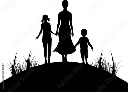 Mother and two children holding hands on a hill silhouette