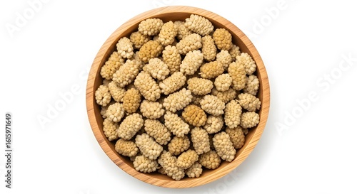 A top view of a wooden bowl filled with dried white mulberries on a plain white background surface view