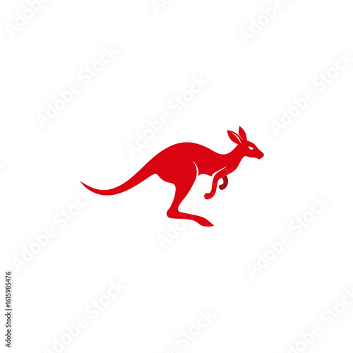 kangaroo hopping across red australian outback