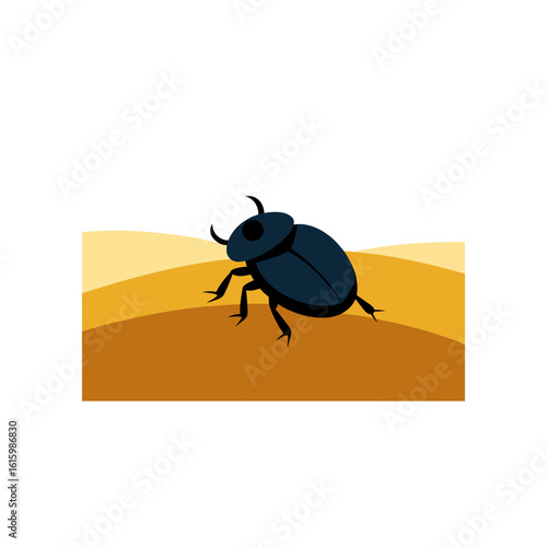 scarab beetle crawling over golden sand