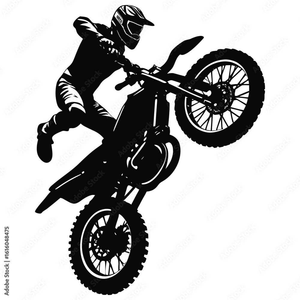 Fototapeta premium Silhouette of Motocross Rider Performing a Wheelie on a Dirt Bike