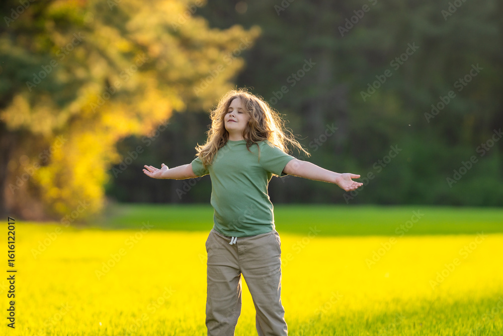 Child practicing calm meditation outdoors. Kid meditation in peaceful nature. Meditation moment with young child. Calm child. Meditate freely. Zen kids moment in green meadow. Nature child meditation. Child practicing calm meditation outdoors. Kid meditation in peaceful nature. Meditation moment with young child. Calm child. Meditate freely. Zen kids moment in green meadow. Nature child meditation.