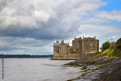 Wallpaper Mural Scenic view of Blackness Castle from the water's edge, long exposure creates soft smooth water. Discover Scotland, explore the United Kingdom, travel Europe. Torontodigital.ca