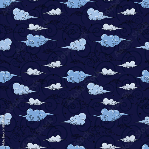 Seamless blue pattern of cute blue clouds for packaging design. Happy childhood dreams.