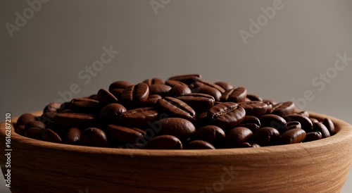 Coffee beans in a wooden bowl