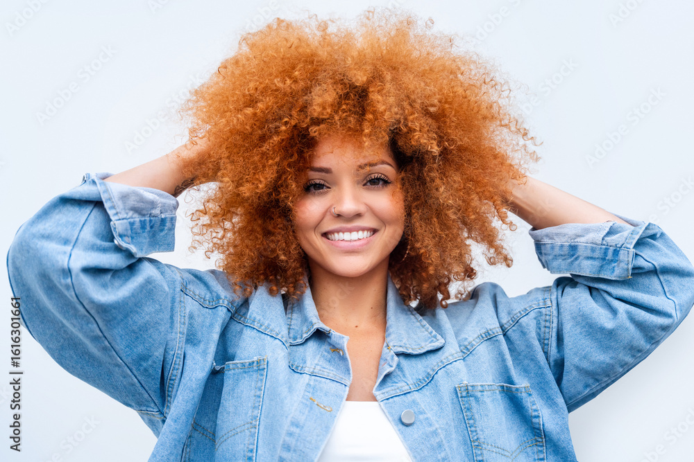 Ταπετσαρία Isolated portrait of ginger teenager girl pulling her red hair curl feeling positive emotion showing satisfied expression standing at white wall cope space