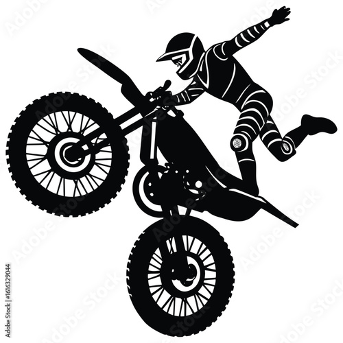 Silhouette of a fearless motorcyclist performing a daring stunt on a motocross bike