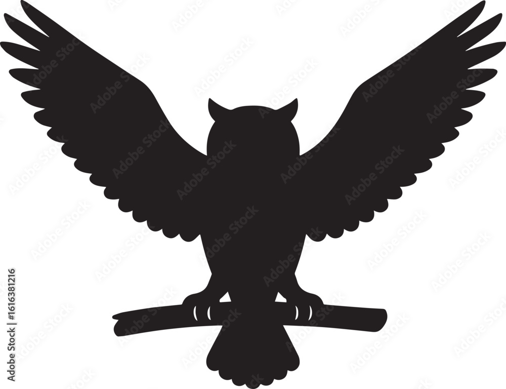 Fototapeta premium Black owl silhouette perched on branch with wings spread bird