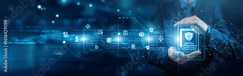 Compliance officer hands holding document policy network connections governance rules enforcement standards control regulations accountability procedures documentation framework.