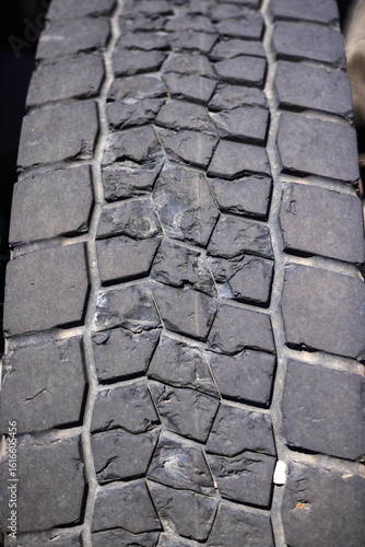 Wear of the rubber on a truck wheel
