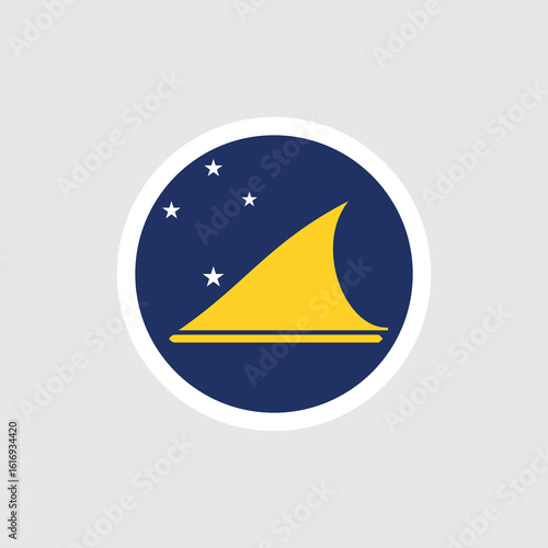 The flag of Tokelau. A blue flag with a canoe and stars. A dependent territory of New Zealand.