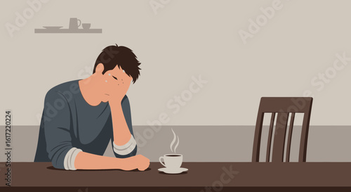 A Depressed Man Sitting at a Table with a Cup of Coffee Feeling Exhausted