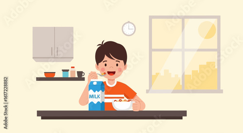 Boy Eating Breakfast Cereal and Milk Early In The Morning At Home
