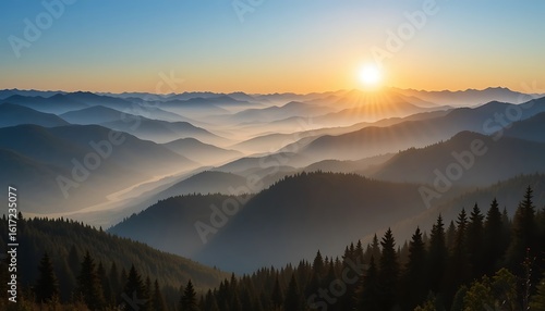 Majestic Sunrise over Rolling Mountain Ranges and Misty Valleys
