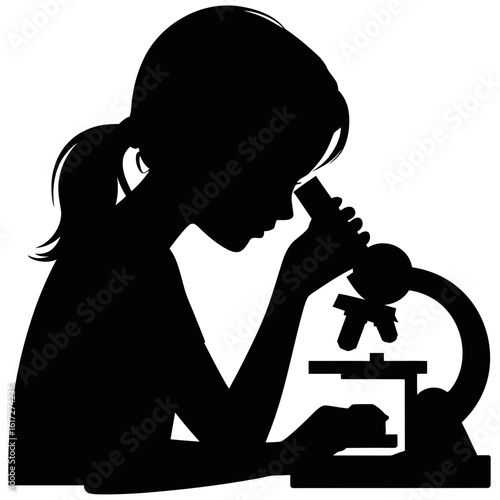 Silhouette of a young girl looking through a microscope