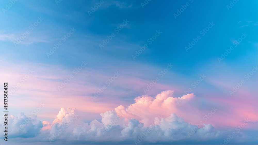 Obraz premium Surreal pastel-colored clouds floating in a digital dream sky, gradient background shifting from baby blue to soft pink. No sun, just ambient glow. Minimal dreamscape style with peaceful, whimsical fe