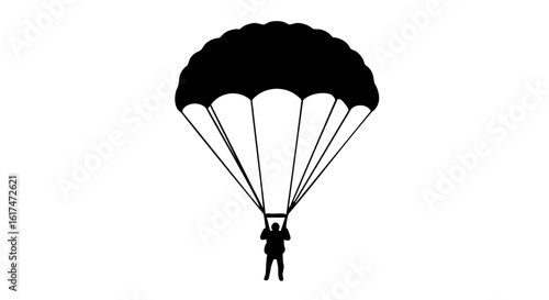 Silhouette of a Skydiver descending from a Parachute
