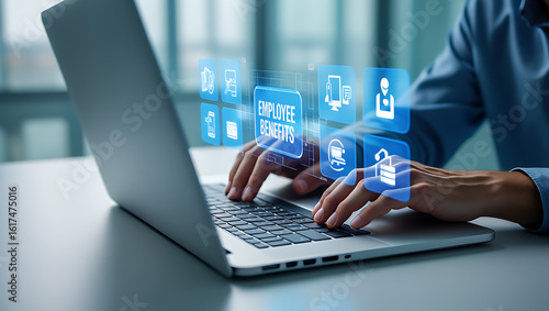 Wallpaper Mural Person typing on laptop with employee benefits icons hands Torontodigital.ca