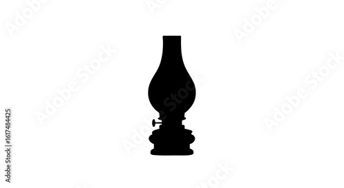 A silhouette of a classic oil lamp against a bright backdrop. 